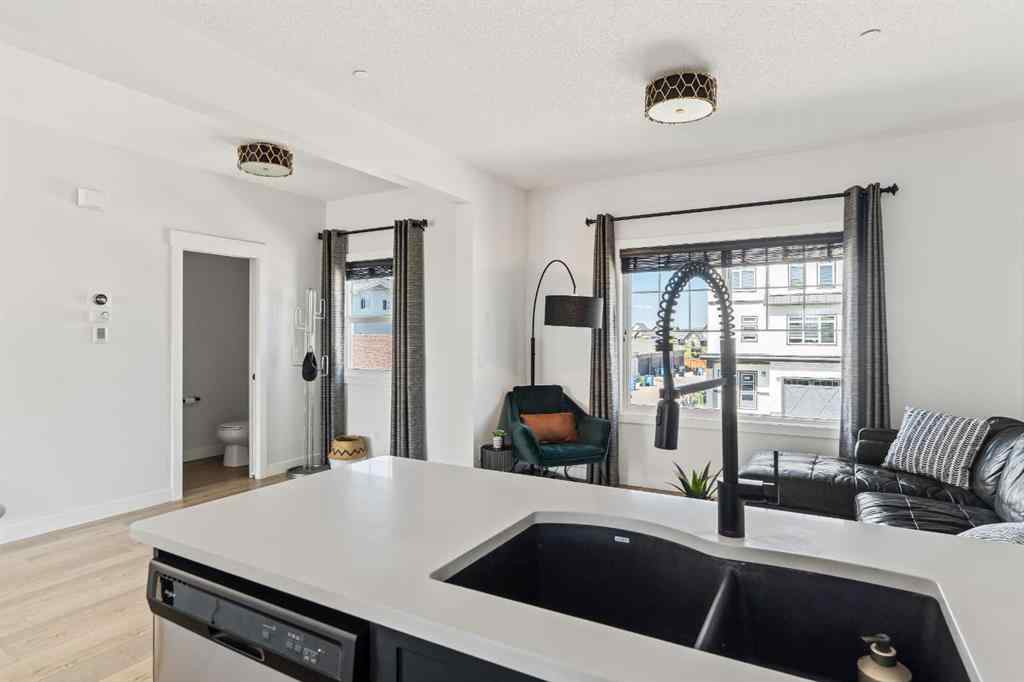 MLS® A2244317 - 233 Lucas Manor NW in Livingston Calgary, Residential