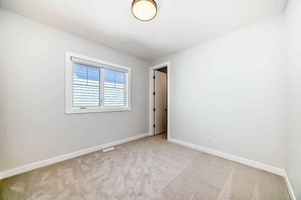 MLS® A2244330 - 406 Spring Creek Circle SW in Springbank Hill Calgary, Residential