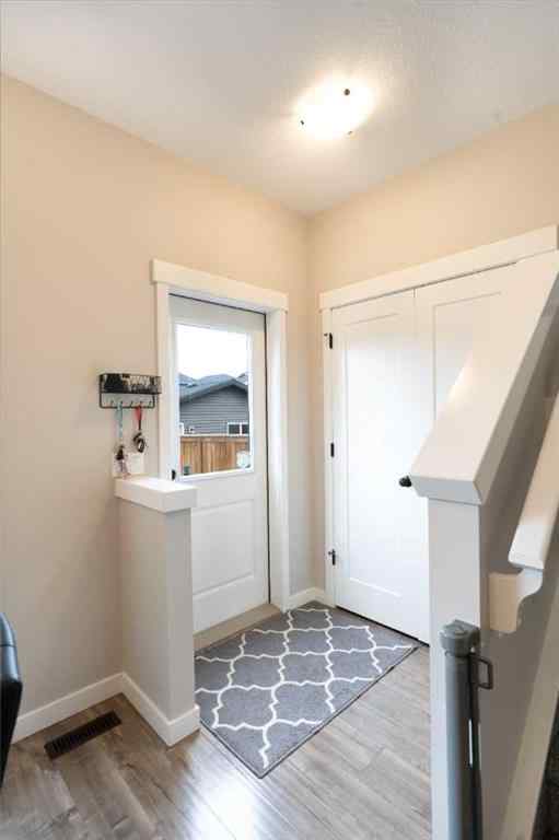 MLS® A2244333 - 228 Ravenstern Crescent SE in Ravenswood Airdrie, Residential