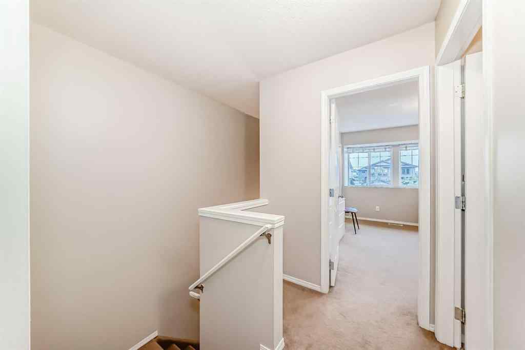 MLS® A2244379 - Unit #402 2066 Luxstone Boulevard SW in Luxstone Airdrie, Residential