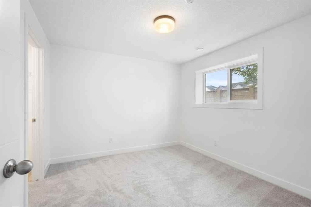 MLS® A2244385 - Unit #86 2117 81 Street SW in Springbank Hill Calgary, Residential