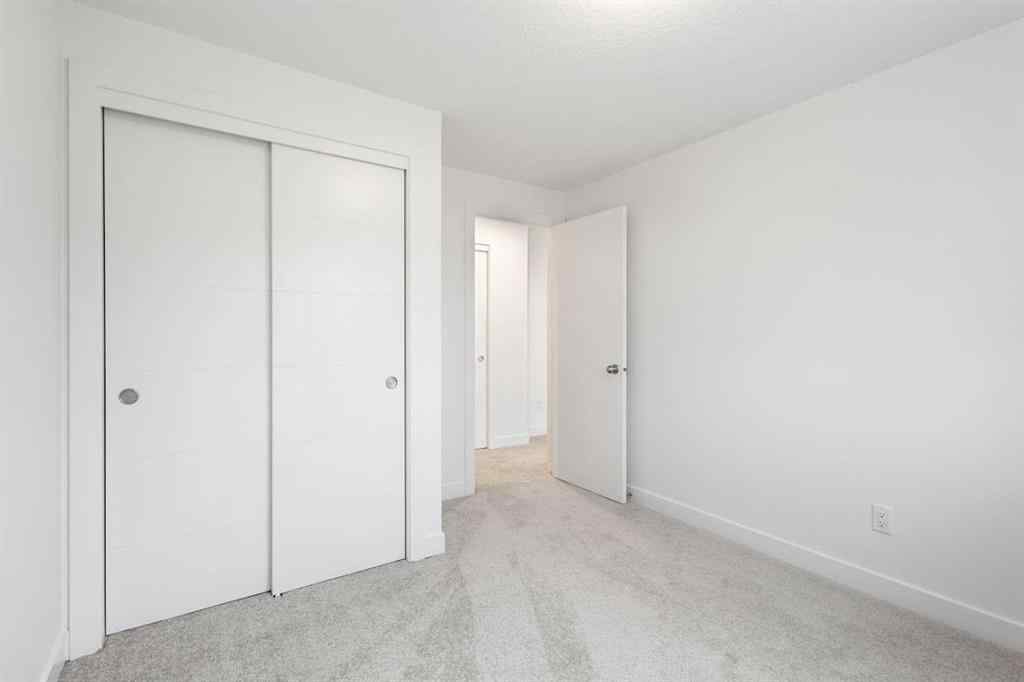 MLS® A2244385 - Unit #86 2117 81 Street SW in Springbank Hill Calgary, Residential