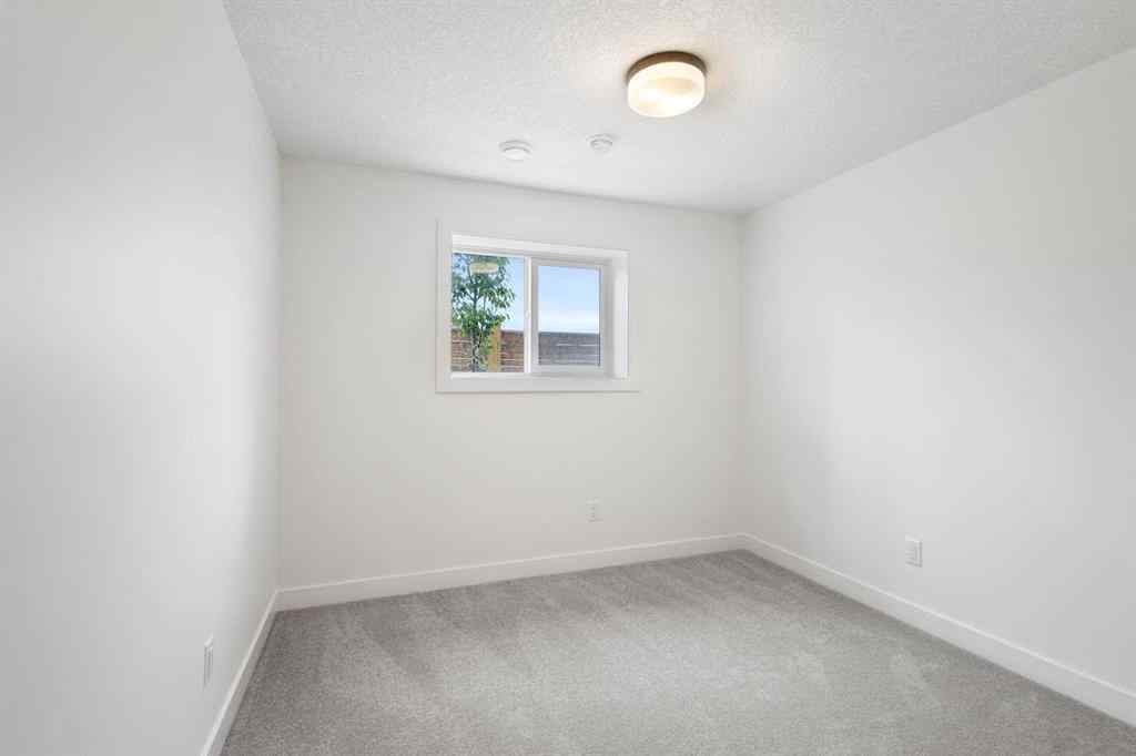 MLS® A2244385 - Unit #86 2117 81 Street SW in Springbank Hill Calgary, Residential