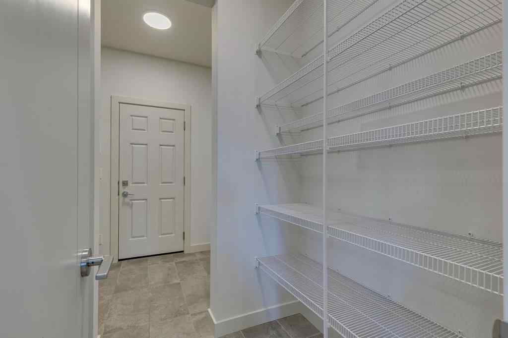 MLS® A2244390 - 69 Shawnee Green SW in Shawnee Slopes Calgary, Residential