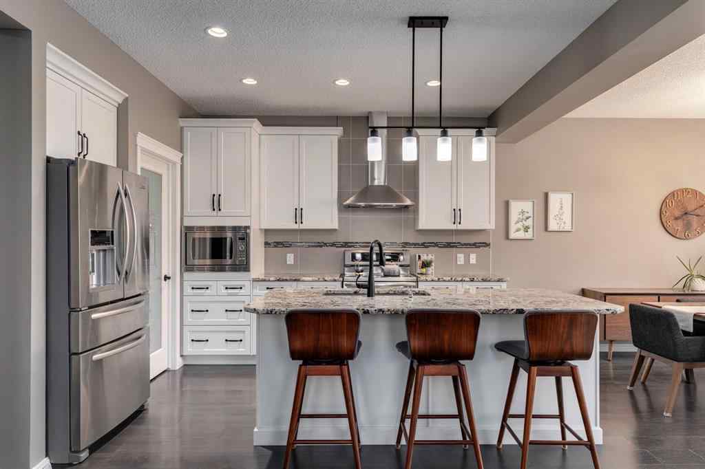 MLS® A2244395 - 1064 Brightoncrest Green SE in New Brighton Calgary, Residential