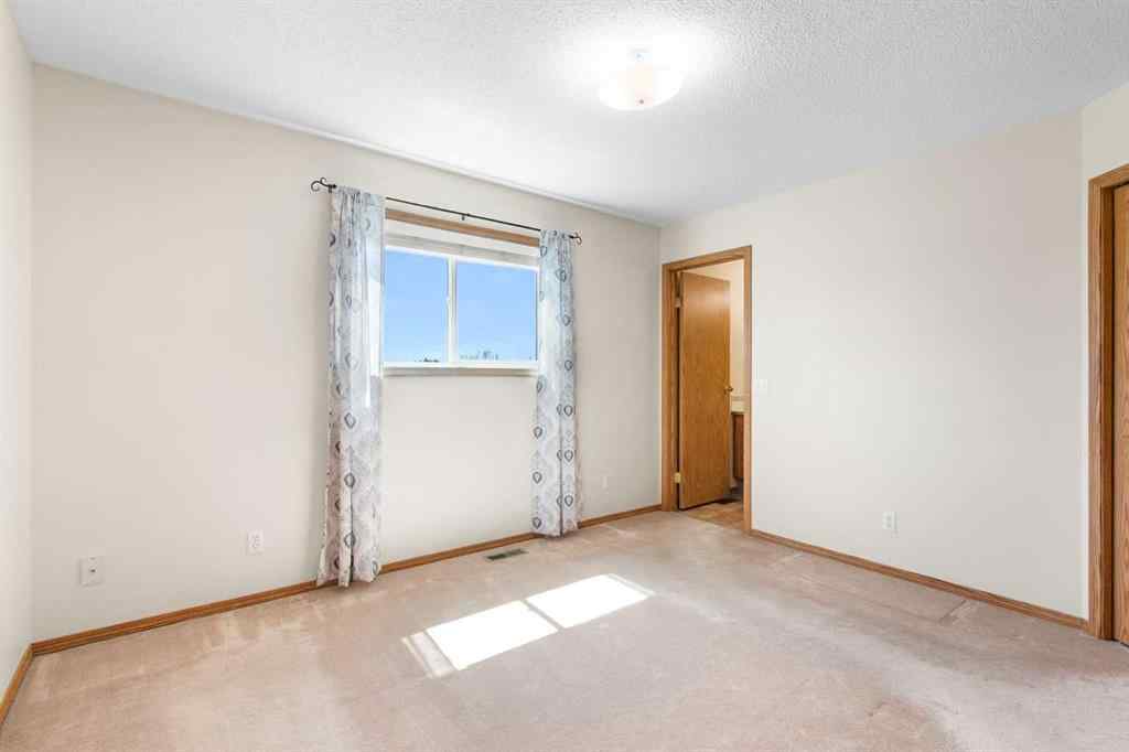 MLS® A2244405 - 131 Tipping Close SE in Thorburn Airdrie, Residential