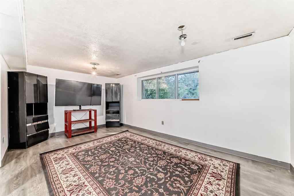 MLS® A2244407 - 221 Theodore Place NW in Thorncliffe Calgary, Residential