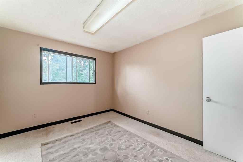 MLS® A2244407 - 221 Theodore Place NW in Thorncliffe Calgary, Residential