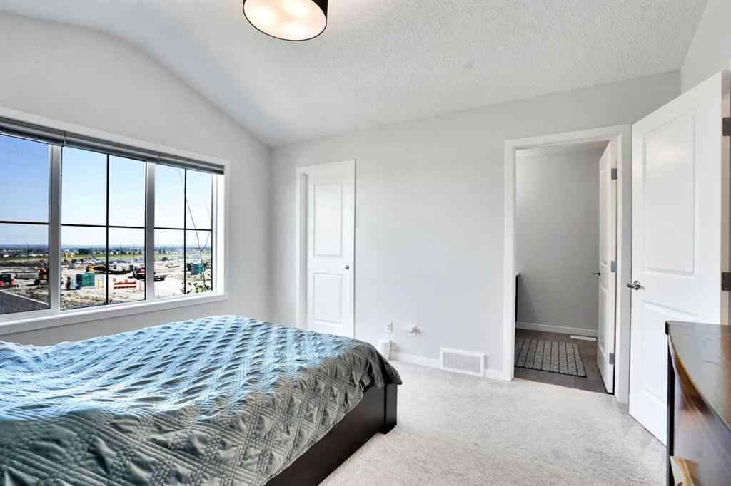 MLS® A2244453 - 15117 37 Street SW in Alpine Park Calgary, Residential