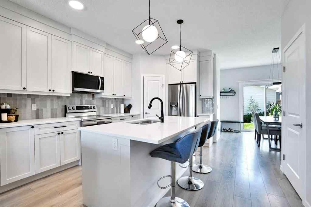 MLS® A2244453 - 15117 37 Street SW in Alpine Park Calgary, Residential
