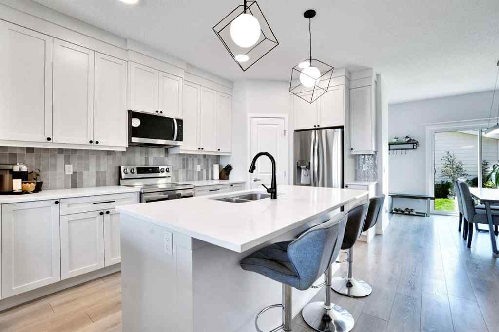 MLS® A2244453 - 15117 37 Street SW in Alpine Park Calgary, Residential