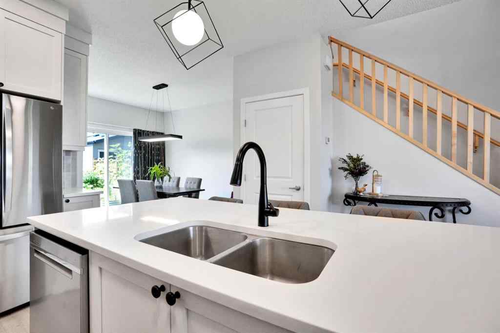 MLS® A2244453 - 15117 37 Street SW in Alpine Park Calgary, Residential