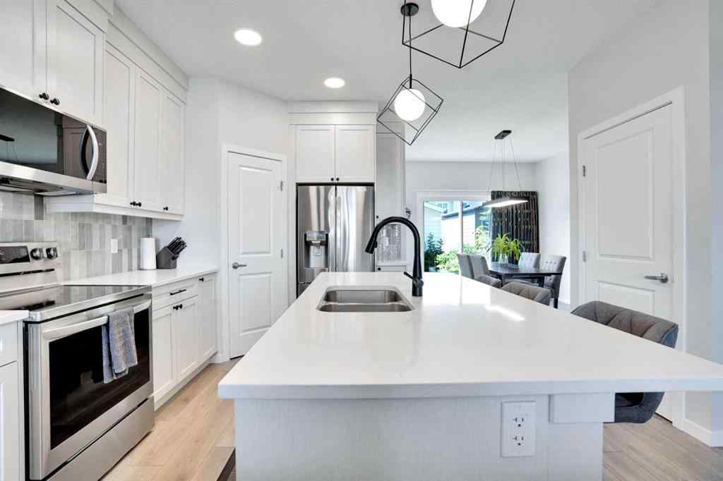 MLS® A2244453 - 15117 37 Street SW in Alpine Park Calgary, Residential