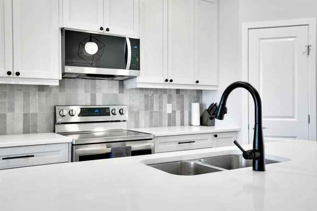 MLS® A2244453 - 15117 37 Street SW in Alpine Park Calgary, Residential