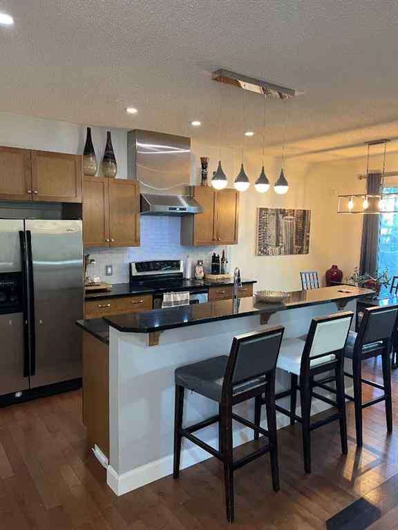 MLS® A2244495 - 12 Aspen Hills Court SW in Aspen Woods Calgary, Residential