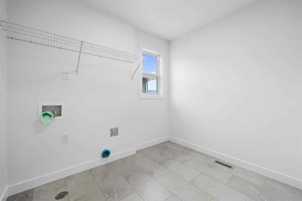 MLS® A2244563 - 626 Bayview Lane SW in Bayview Airdrie, Residential
