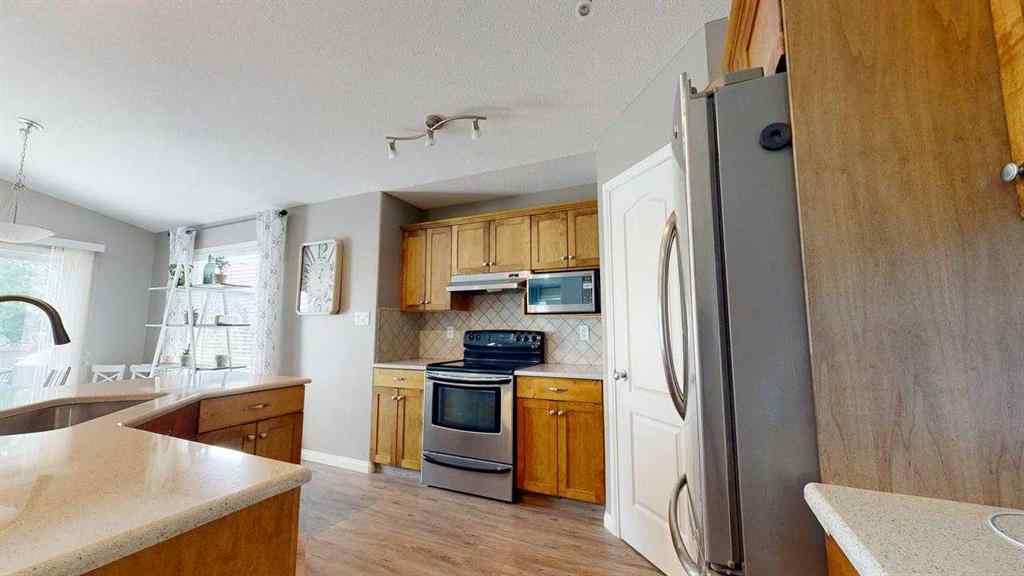 MLS® A2244584 - 91 Coalbanks Gate W in Copperwood Lethbridge, Residential