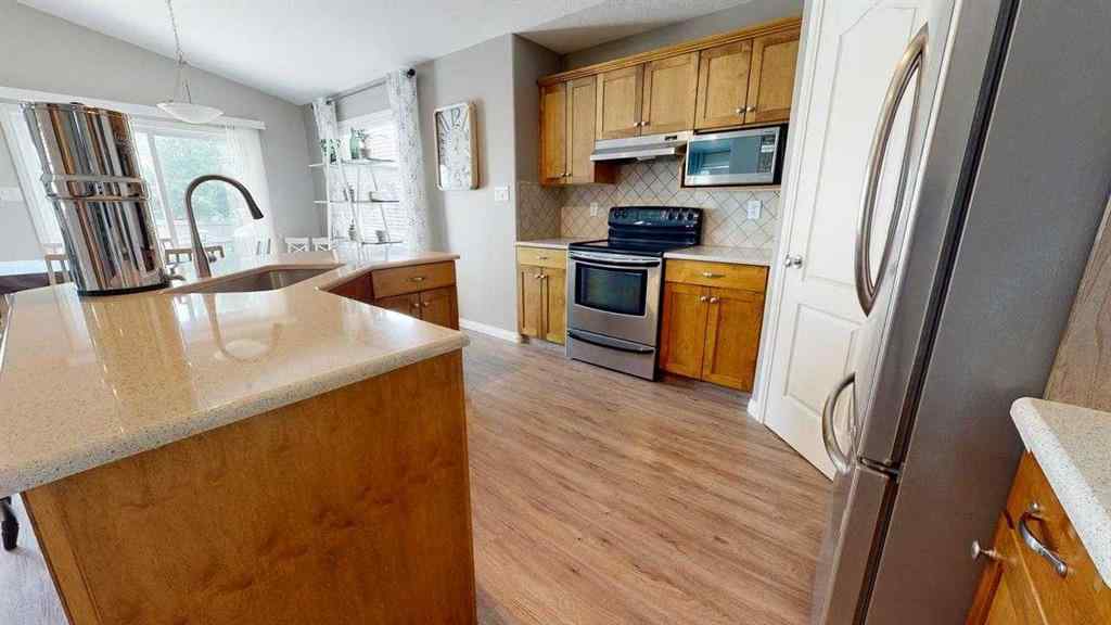 MLS® A2244584 - 91 Coalbanks Gate W in Copperwood Lethbridge, Residential