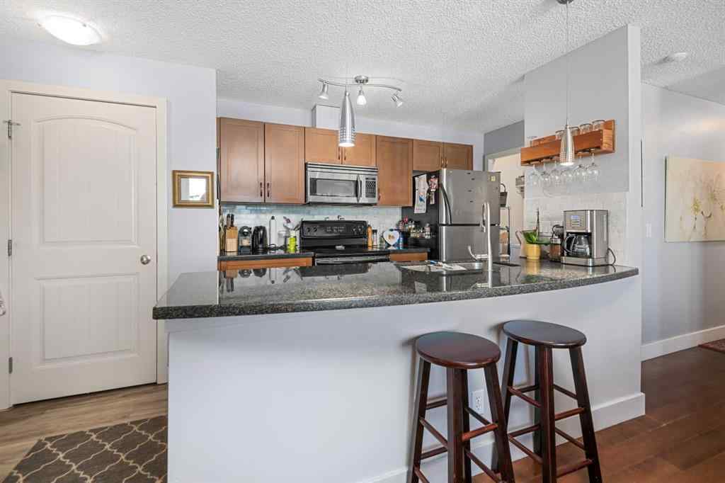 MLS® A2244594 - Unit #4 218 Village Terrace SW in Patterson Calgary, Residential