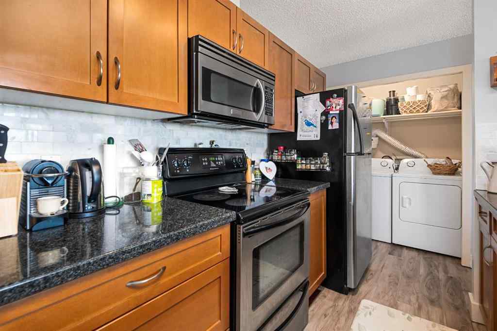 MLS® A2244594 - Unit #4 218 Village Terrace SW in Patterson Calgary, Residential