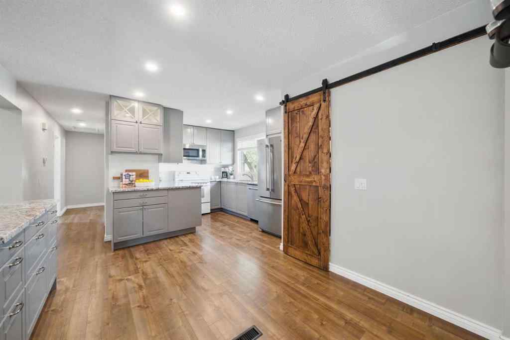 MLS® A2244611 - 828 Hunterston Crescent NW in Huntington Hills Calgary, Residential