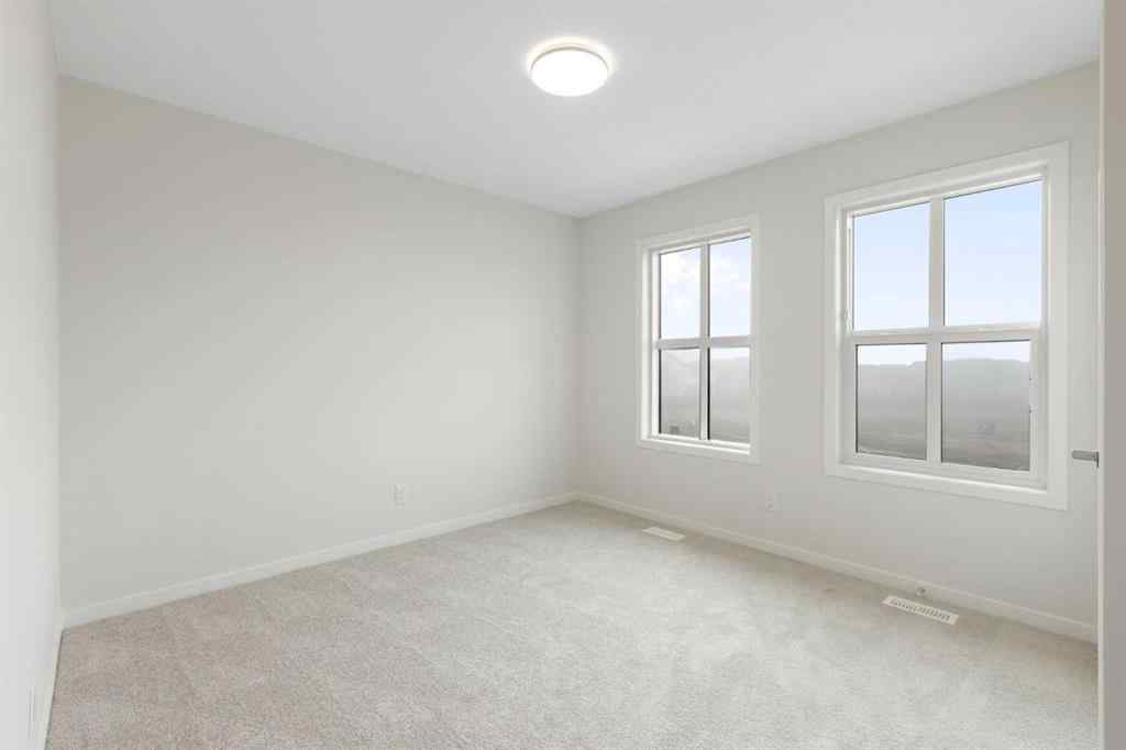 MLS® A2244626 - 69 Royston Grove NW in Haskayne Calgary, Residential