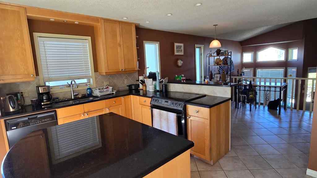 MLS® A2244645 - 203 Arbour Summit Close NW in Arbour Lake Calgary, Residential