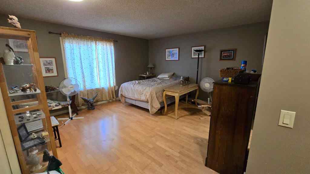 MLS® A2244645 - 203 Arbour Summit Close NW in Arbour Lake Calgary, Residential