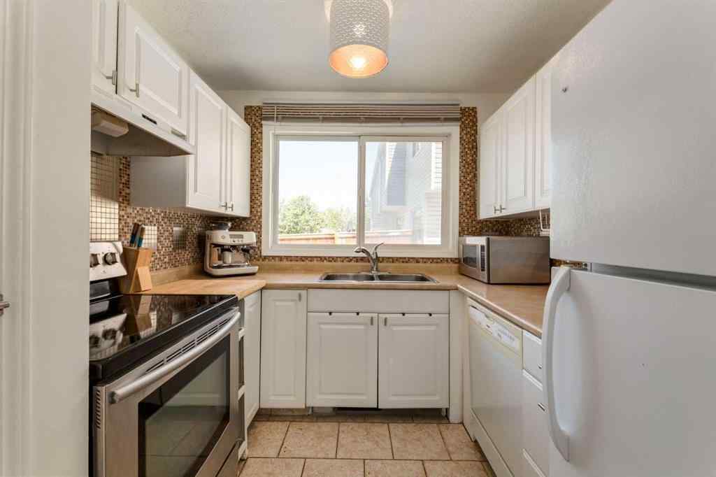 MLS® A2244651 - Unit #21 5425 Pensacola Crescent SE in Penbrooke Meadows Calgary, Residential