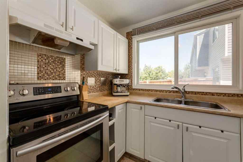 MLS® A2244651 - Unit #21 5425 Pensacola Crescent SE in Penbrooke Meadows Calgary, Residential