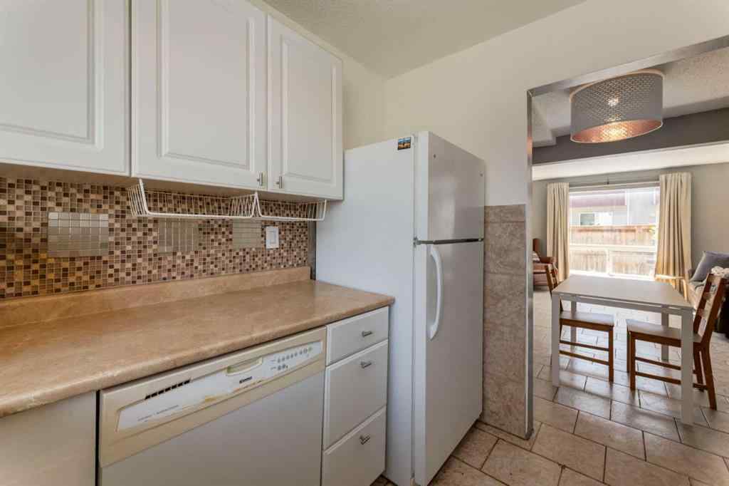 MLS® A2244651 - Unit #21 5425 Pensacola Crescent SE in Penbrooke Meadows Calgary, Residential