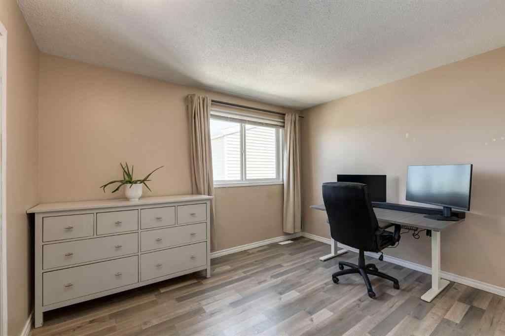 MLS® A2244651 - Unit #21 5425 Pensacola Crescent SE in Penbrooke Meadows Calgary, Residential