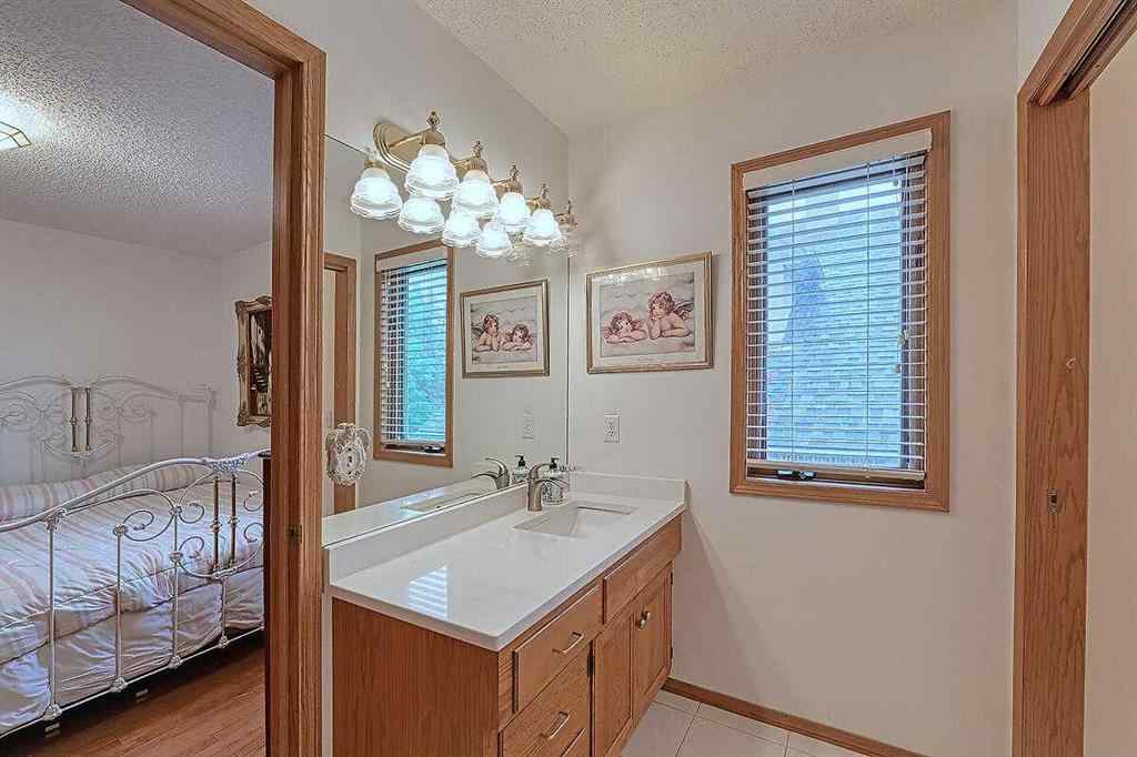 MLS® A2244657 - 115 Strathaven Circle SW in Strathcona Park Calgary, Residential