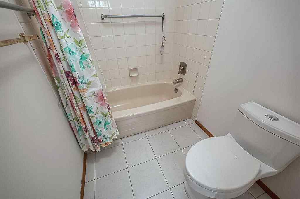 MLS® A2244657 - 115 Strathaven Circle SW in Strathcona Park Calgary, Residential