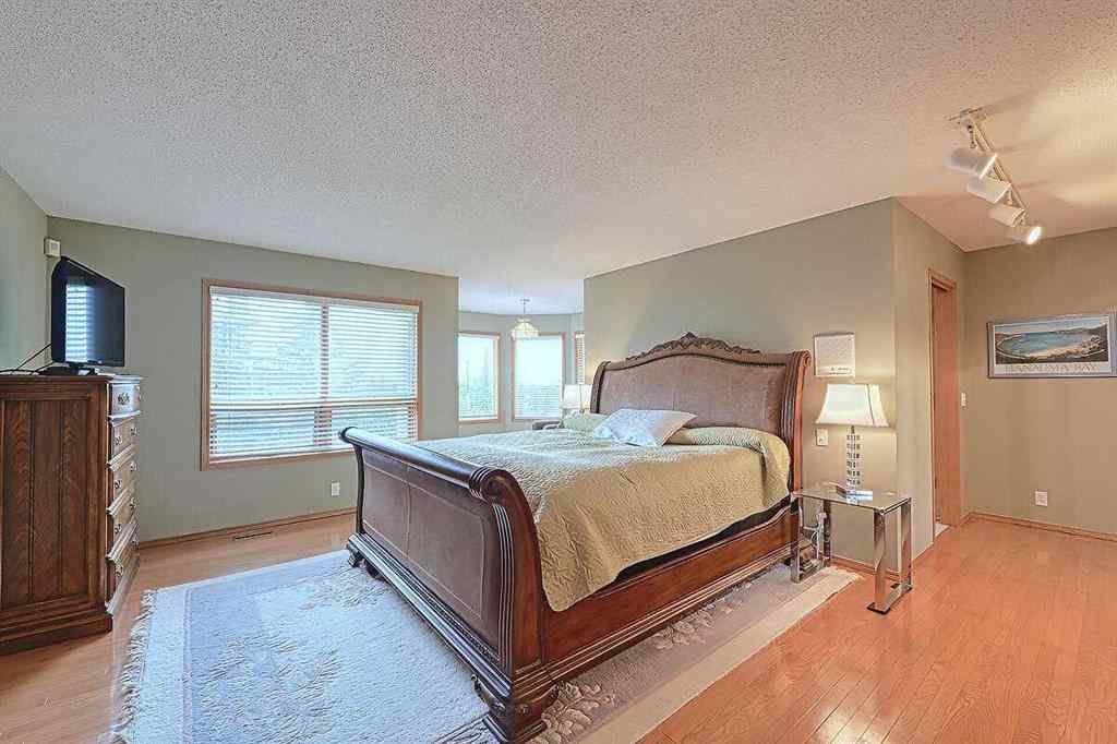 MLS® A2244657 - 115 Strathaven Circle SW in Strathcona Park Calgary, Residential
