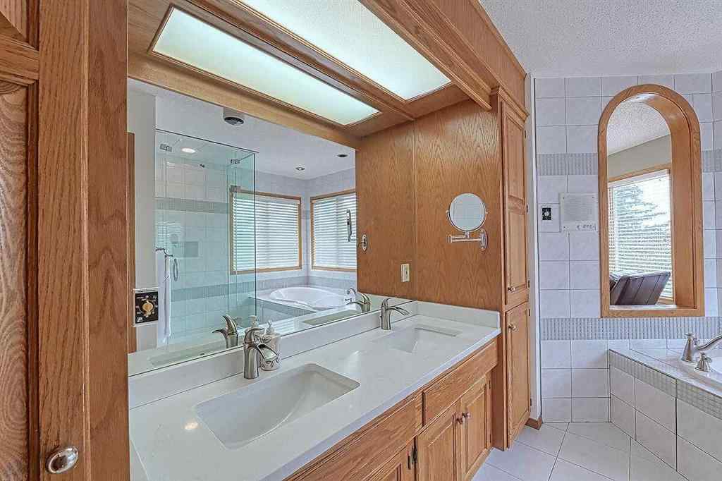 MLS® A2244657 - 115 Strathaven Circle SW in Strathcona Park Calgary, Residential