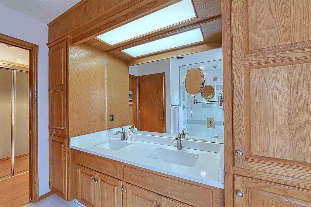 MLS® A2244657 - 115 Strathaven Circle SW in Strathcona Park Calgary, Residential