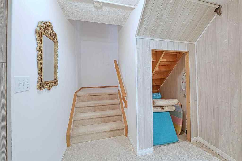 MLS® A2244657 - 115 Strathaven Circle SW in Strathcona Park Calgary, Residential