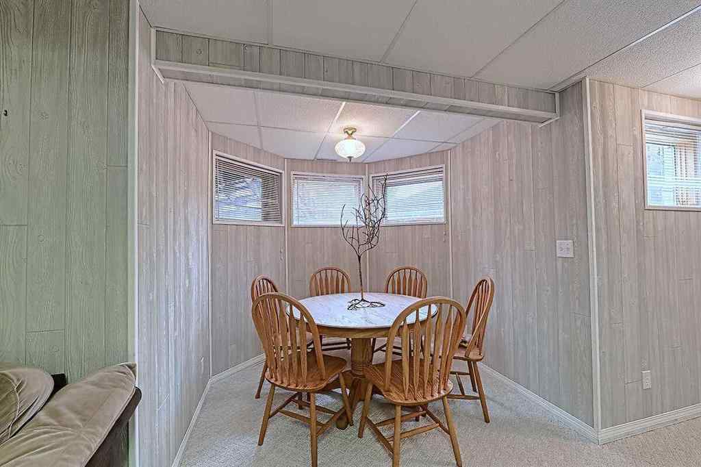 MLS® A2244657 - 115 Strathaven Circle SW in Strathcona Park Calgary, Residential