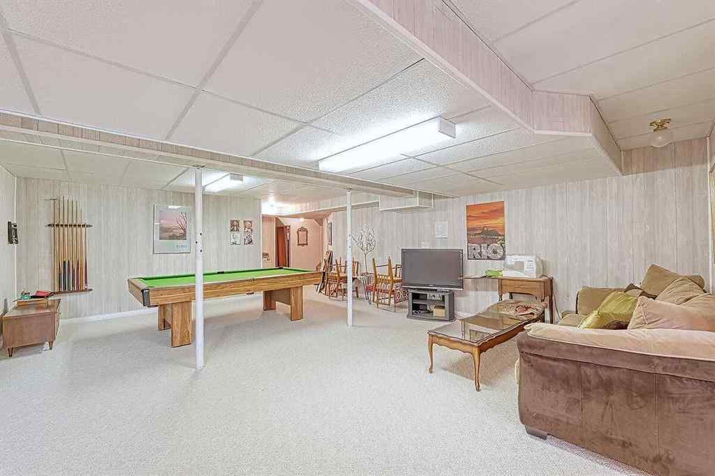 MLS® A2244657 - 115 Strathaven Circle SW in Strathcona Park Calgary, Residential