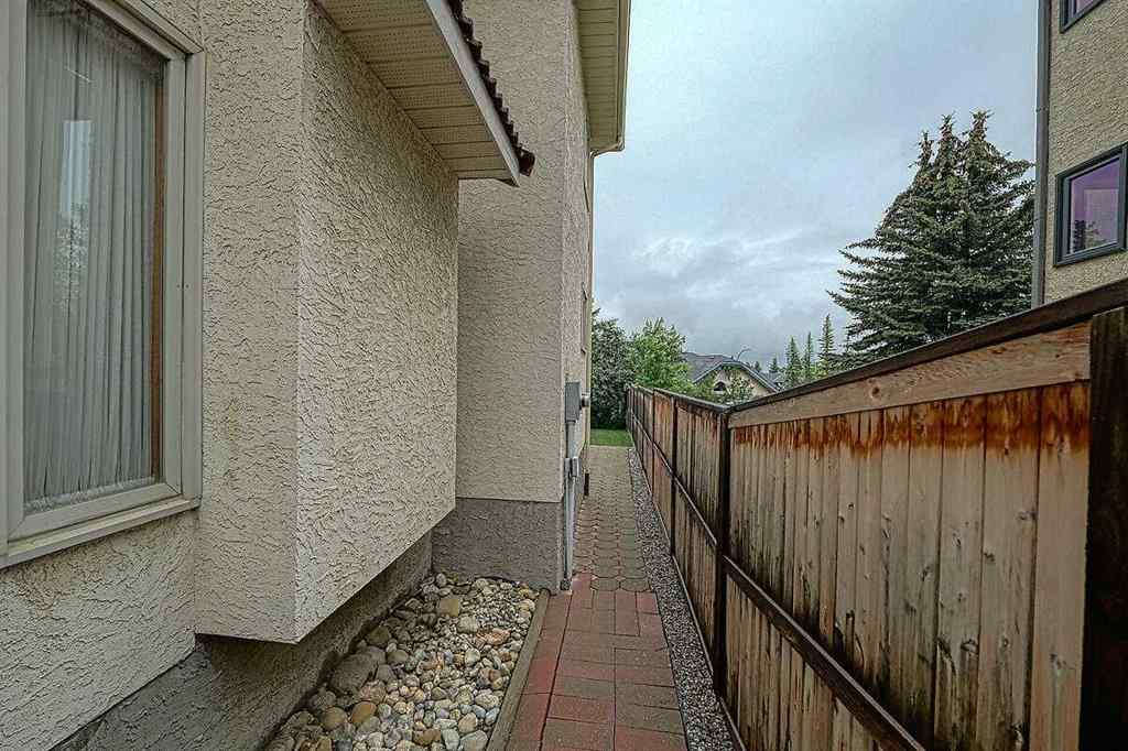 MLS® A2244657 - 115 Strathaven Circle SW in Strathcona Park Calgary, Residential