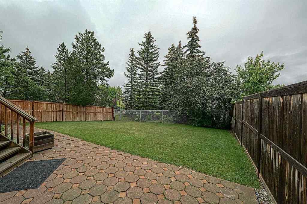 MLS® A2244657 - 115 Strathaven Circle SW in Strathcona Park Calgary, Residential