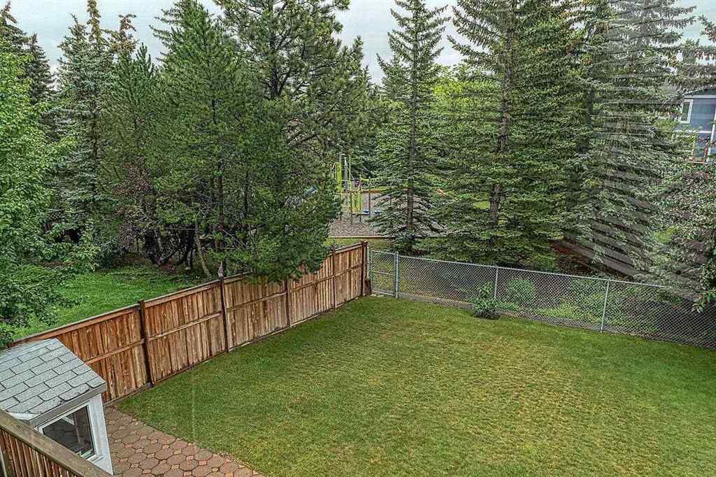 MLS® A2244657 - 115 Strathaven Circle SW in Strathcona Park Calgary, Residential