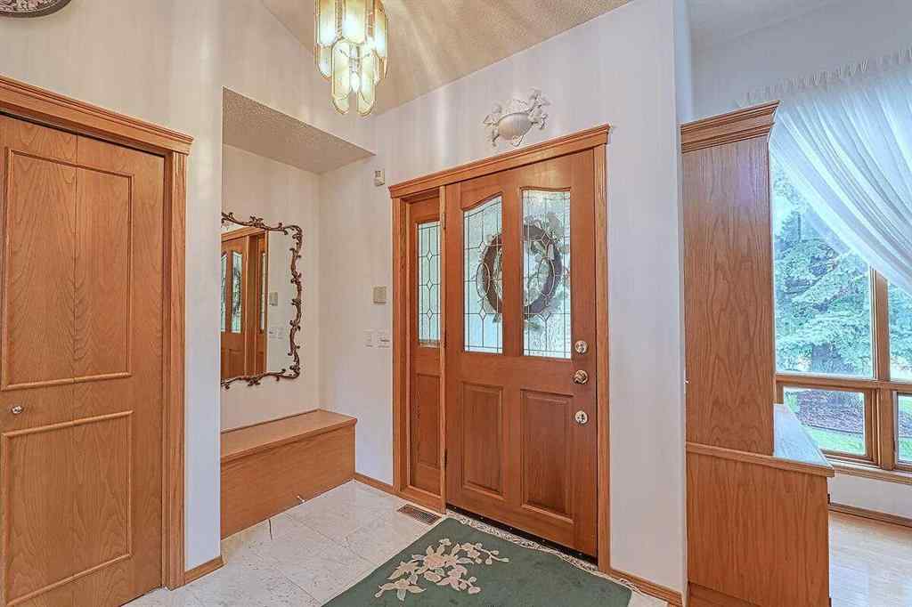 MLS® A2244657 - 115 Strathaven Circle SW in Strathcona Park Calgary, Residential