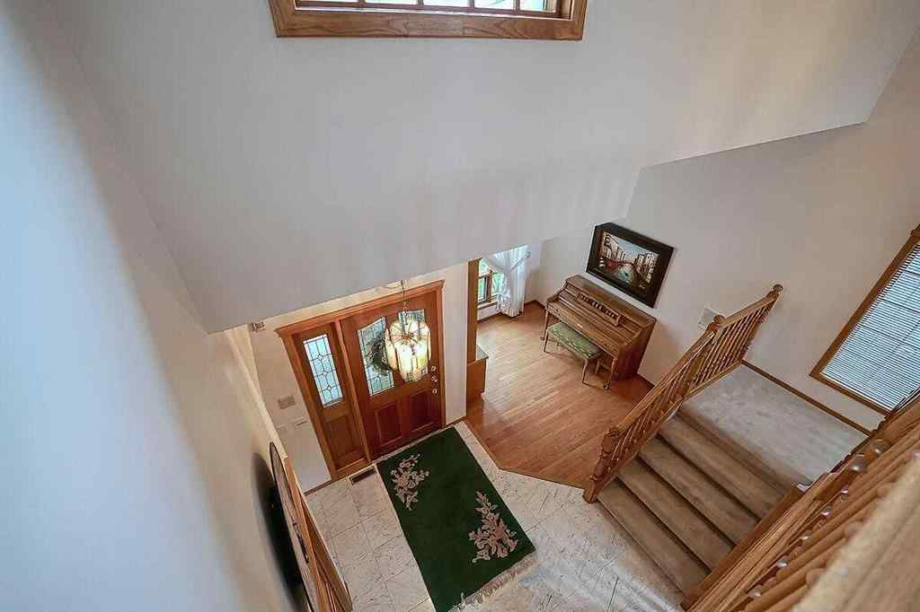 MLS® A2244657 - 115 Strathaven Circle SW in Strathcona Park Calgary, Residential