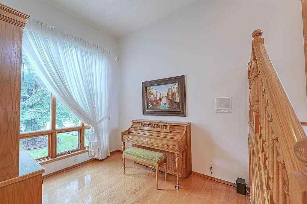 MLS® A2244657 - 115 Strathaven Circle SW in Strathcona Park Calgary, Residential