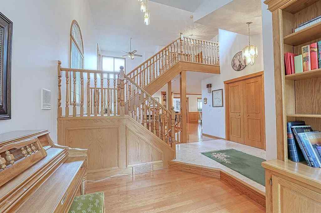 MLS® A2244657 - 115 Strathaven Circle SW in Strathcona Park Calgary, Residential