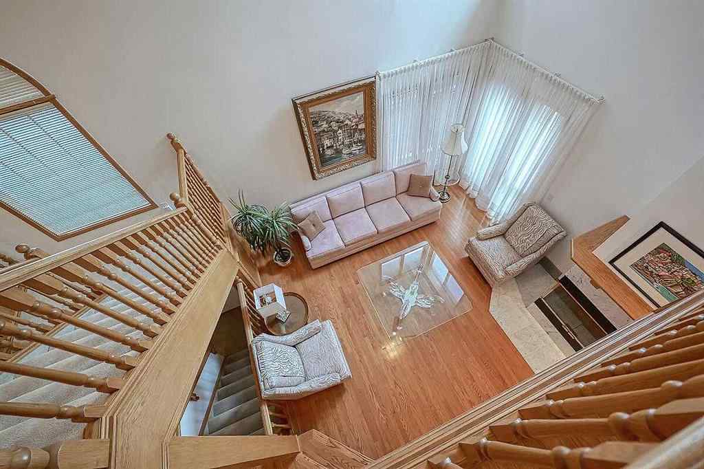 MLS® A2244657 - 115 Strathaven Circle SW in Strathcona Park Calgary, Residential