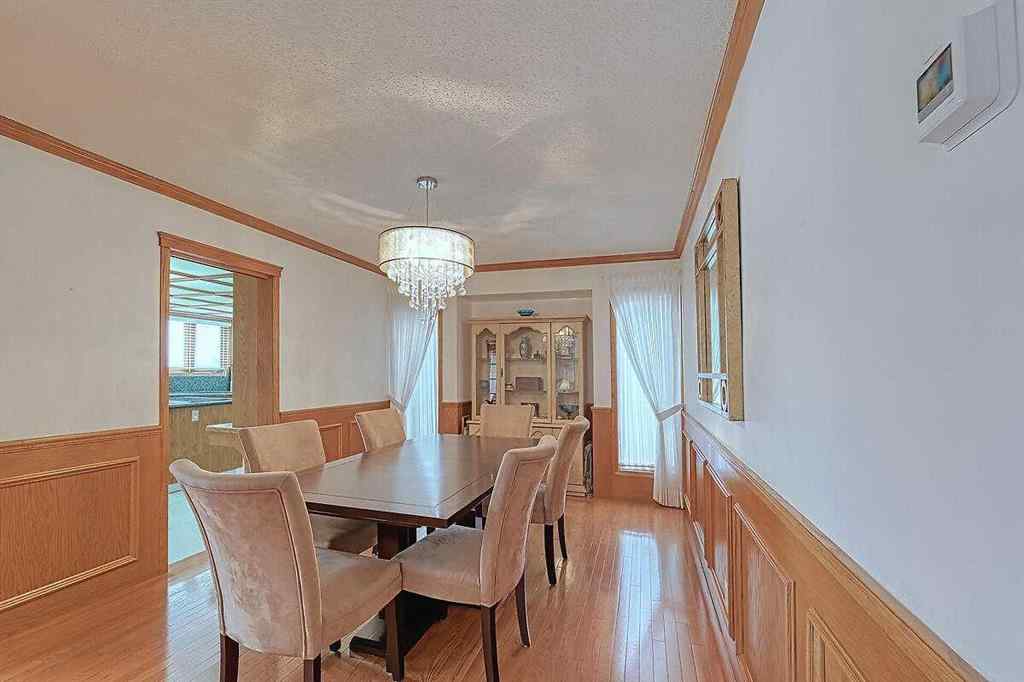 MLS® A2244657 - 115 Strathaven Circle SW in Strathcona Park Calgary, Residential