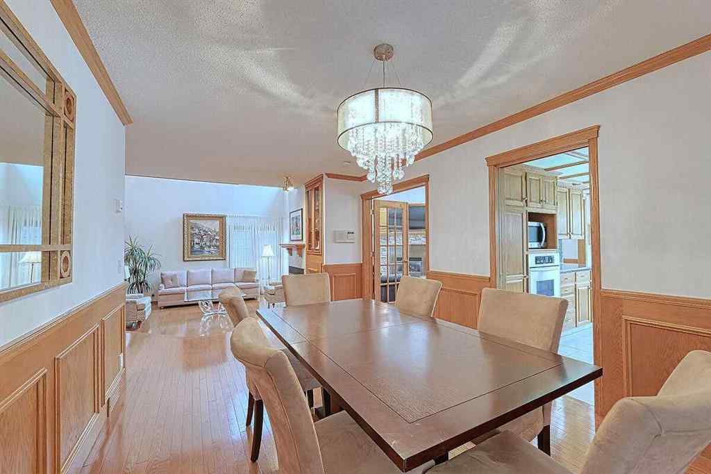MLS® A2244657 - 115 Strathaven Circle SW in Strathcona Park Calgary, Residential